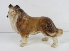 A melba figurine of a Collie dog.