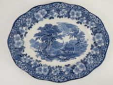 A blue and white meat plate in Woodland