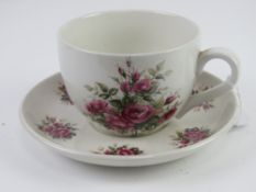 A Portmeirion oversized cup and saucer -
