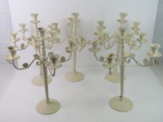 A set of five contemporary cream painted