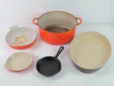 Le Creuset; a metal casserole dish, a c