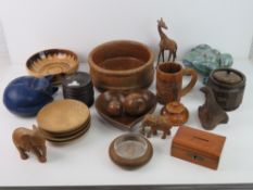 A collection of wooden ornaments includi