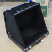 A collapsible guitar stand by Stagg.