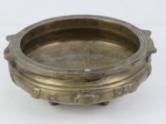 A heavy 20th century brass censor in the