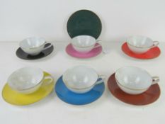 A set of six harlequin Noritake cups and saucers with additional saucer.