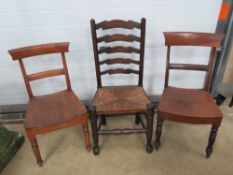 Three assorted dining and kitchen type chairs, one with ladder back and cane seat.