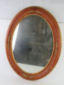 A large contemporary oval wall mirror by Bright's of Nettlebed 85 x 66cm overall.