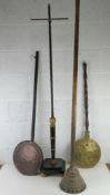 An ebonised and gold painted Georgian firescreen pole having brass fitting together with copper