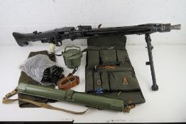 A deactivated MG53 with gunners kit in pouch, Breach Cover, Side Drum Magazine, Spare Barrel Case,