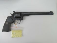A deactivated Dan Wesson .22 LR Revolver with ten inch barrel.