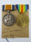 A WWI War and Victory medal pair for 19063 Pte. C.W. Egmorf, Norfolk Regiment.
