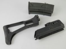 A German Heckler and Koch G36 Stock with locking latch mechanism.