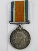 A 1914-1918 war medal for a pte W. BLACKSHAW, Cheshire regiment.