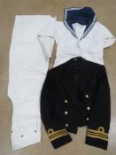 Navy dress jacket + navy white and blue uniform with sergeants rank slide.