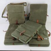 Five Soviet Cold War military RPG-2 rocket launcher packs.
