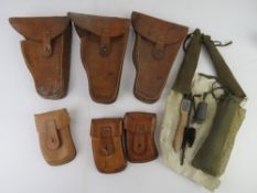 Three Skorpion smg sets, includes smg holster, magazine pouch and cleaning kit.