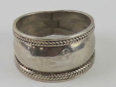 A men's silver graduated ring size W, stamped 925.