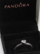 A silver Pandora stackable ring with white stone heart, size 52, stamped 925 with ALE maker's mark,