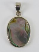 A silver and Abalone shell pendant stamped 925 and measuring 3.6cm inc bale.