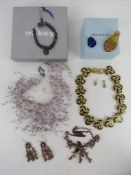 A large quantity of assorted costume jewellery inc two pieces marked for Monet and other designer