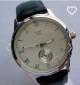 A superb Mercedes Benz Gullwing gentleman's wristwatch. New old stock and discontinued 20 years.