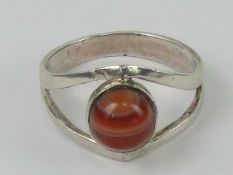 A HM silver banded carnelian ring of geometric design, hallmarked 925, size Q.
