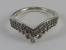 A silver Pandora stackable ring with white stones, size 52, stamped 925 with ALE maker's mark,