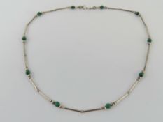 A Native American style malachite and silver bead necklace, the clasp stamped 925.