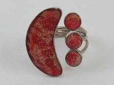 A handmade crescent moon and cabachon design ring stamped 925, size T.