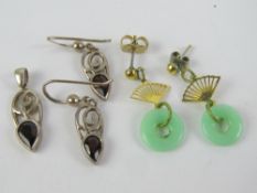 A quantity of costume jewellery, pin badges and jewellery fixing items.