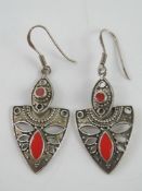 A pair of well made 925 silver articulated earrings, total drop approx 5cm on black velvet stand.