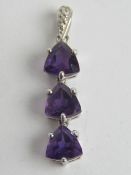 A silver and amethyst pendant, stamped 925, 2.8cm inc bale.