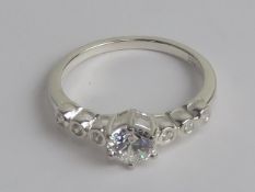 Two white stone silver rings, each stamped 925, size Q-S.