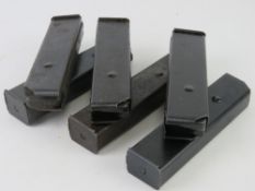 Six Beretta 38 SMG Short Magazines.
