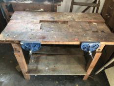 A small workbench with two vices mounted upon, 120 x 60 x 84cm.