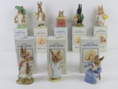 Royal Albert Beatrix Potter; eight figurines with associated boxes being 'Mrs Rabbit',