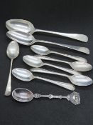 A quantity of silver spoons including set of five HM silver teaspoons, single sterling silver spoon,