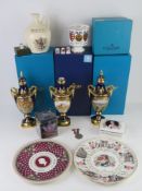 A quantity of commemorative wares inc three cobalt blue ground lidded urns by Coalport.