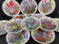 A collection of Franklin porcelain 'flowers of the year' plates.