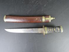 An antique Japanese Tanto with cord-covered tsuka, brass and silver fuchi and kashera,