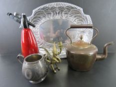 A copper kettle together with a Sparklet soda siphon,
