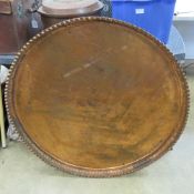 A large and impressive copper tabletop approx 98cm dia and weighing 8.