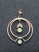 A 9ct gold late Victorian early Edwardian peridot and seed pearl pendant, stamped 9c.