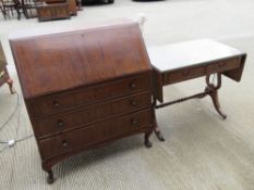 A half veneered mahogany fall front bureau, lid opening to reveal various compartments within,