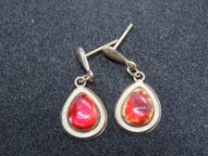 A pair of 9ct gold teardrop shaped earrings, stamped 375 to stud.