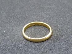A 22ct gold plain band ring, hallmarked, size K, 2.