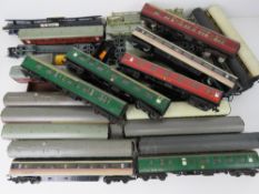 A quantity of model railway wagons and carriages mostly by Triang.
