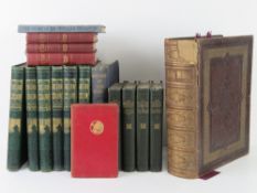 A Victorian leather bound bible together with a quantity of other vintage books.