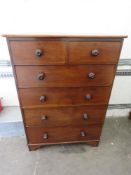 A good late 19th century mahogany chest of two short over four long drawers all with turned wooden