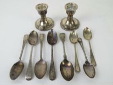 A pair of HM silver short candlesticks.